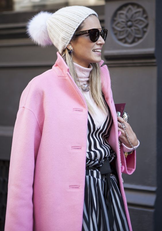 Street Style during New York Fashion Week throughout the city during February 6-13, 2014.