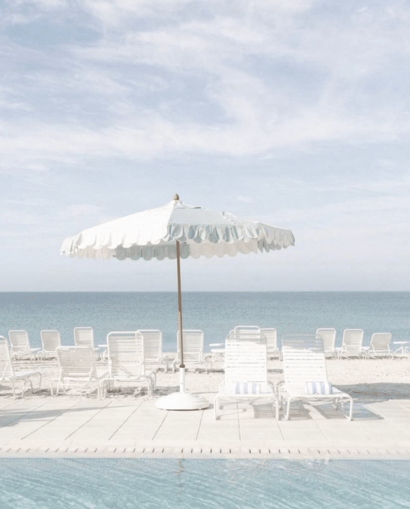 beach chairs and scalloped umbrellas