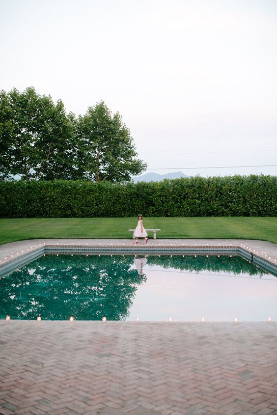 little girl by pool