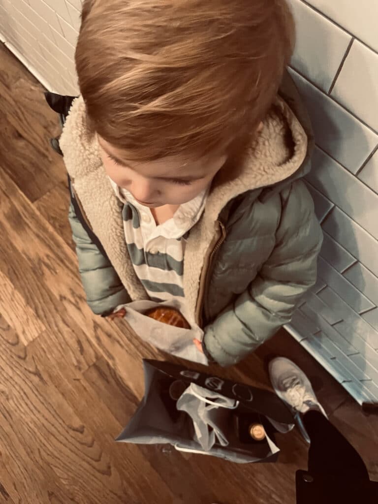 little boy in rugby stripe shirt