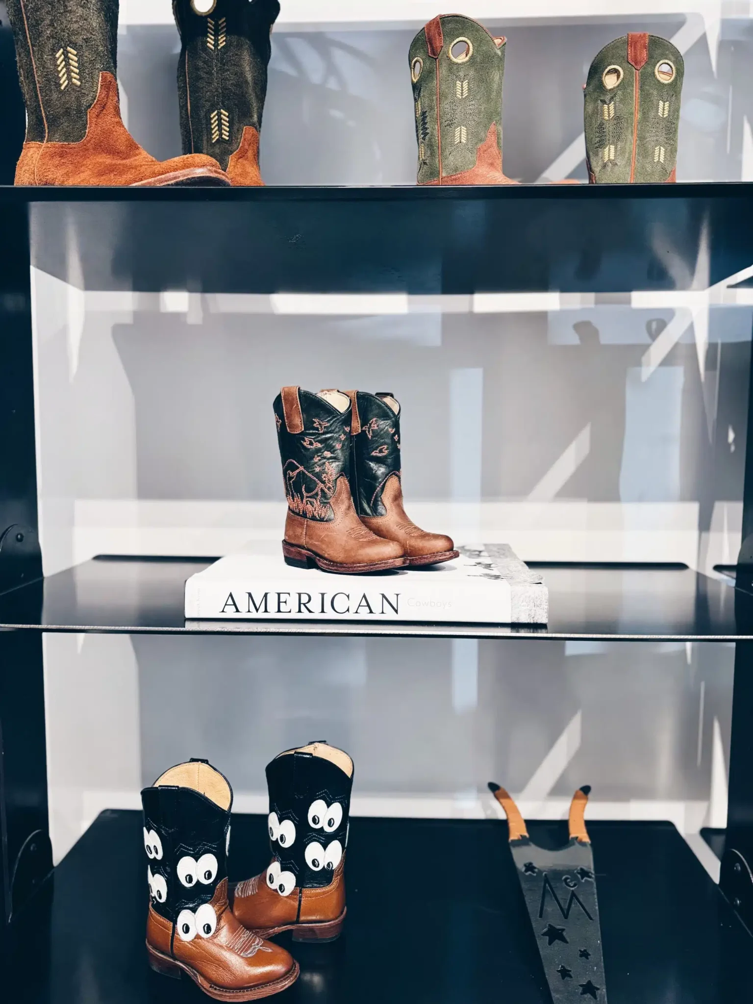 miron crosby boots on shelf in aspen colorado
